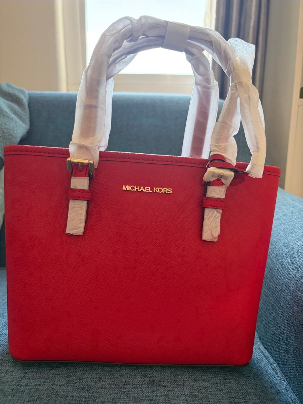 Michael Kors Bright Red Jet Set Travel with Gold Hardware